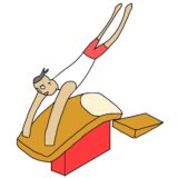 跳馬を飛ぶ男子体操選手