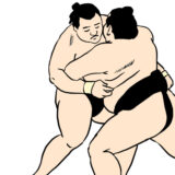 土俵で押し合う力士